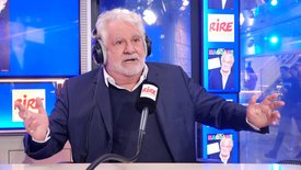 Roland Magdane : sa célèbre moustache, c'est juste à cause ... d'un coup de soleil !
