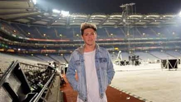 One Direction : de retour à Dublin, heureux même sous la pluie !