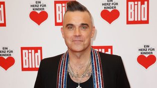 VIDÉO - Robbie Williams retrouve ses enfants après 3 semaines de quarantaine