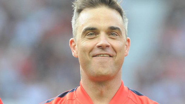 Robbie Williams : très sexy dans son clip "Party Like a Russian"