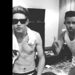 MC Nialler shirtless while singing Gangsta Paradise