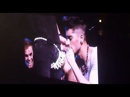 Zayn eating candy off of Harrys thong
