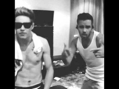 MC Nialler shirtless while singing Gangsta Paradise