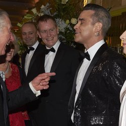Robbie Williams et Lady Gaga rencontrent la famille royale