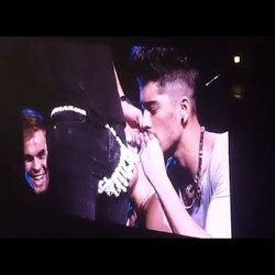 Zayn eating candy off of Harrys thong