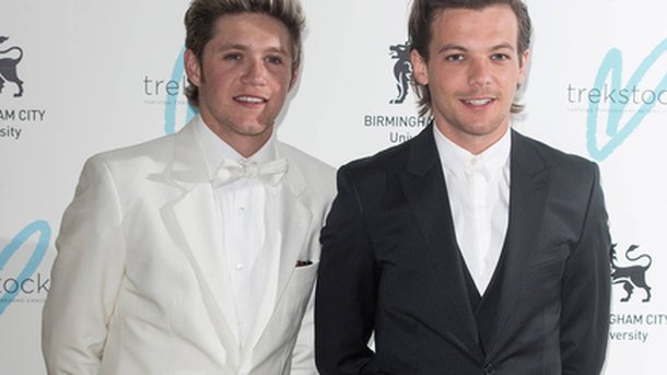 Louis Tomlinson attaque Niall Horan avant leur match de foot!
