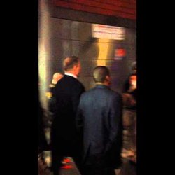 Jay-Z and Chris Martin getting off the tube and walking to the O2!! 