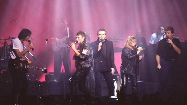 Jean-Jacques Goldman, Michel Sardou, Johnny Hallyday... : l’histoire de la première bande d’Enfoirés
