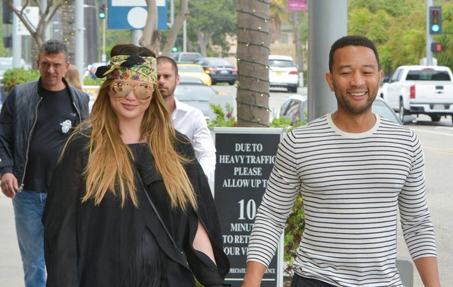 Chrissy Teigen and John Legend step out in Beverly Hills smiling