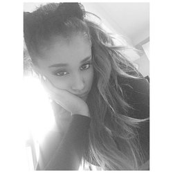 Ariana Grande: w my chin in the palm of my hand