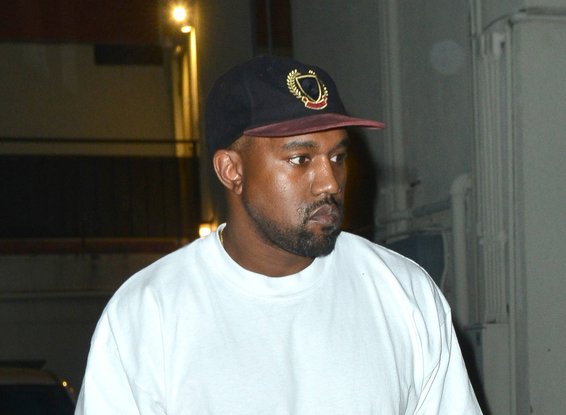 Kanye West is all smiles while leaving Matsuhisa Sushi restauran