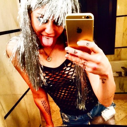 Miley Cyrus: You know the nights been a good one when you stole a shirt from a stripper