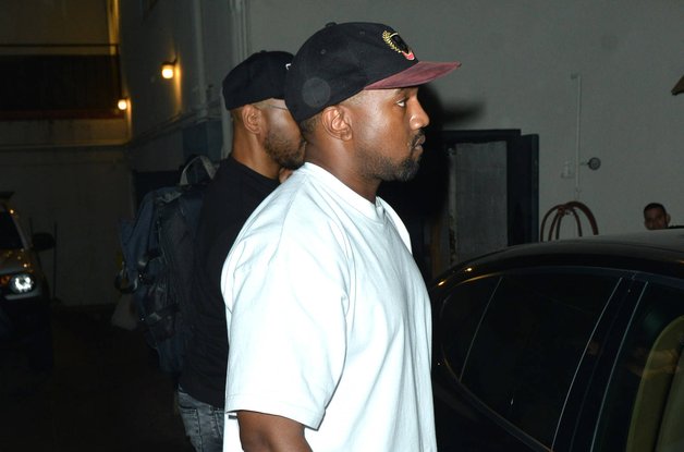 Kanye West is all smiles while leaving Matsuhisa Sushi restauran
